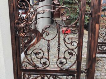 Ogrodzenie kute z&nbsp;ornamentami OK 061